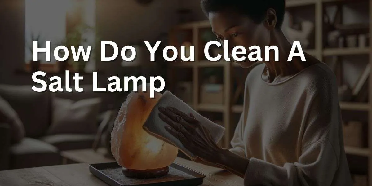 a person gently cleaning a Himalayan salt lamp with a dry, soft cloth. The scene is set in a well-organized room with natural light streaming in, creating a serene atmosphere. The person, a middle-aged Black woman with short hair, is carefully wiping the lamp to remove dust without dissolving the salt. The lamp is placed on a sturdy table with a protective tray underneath to catch any loose salt particles.