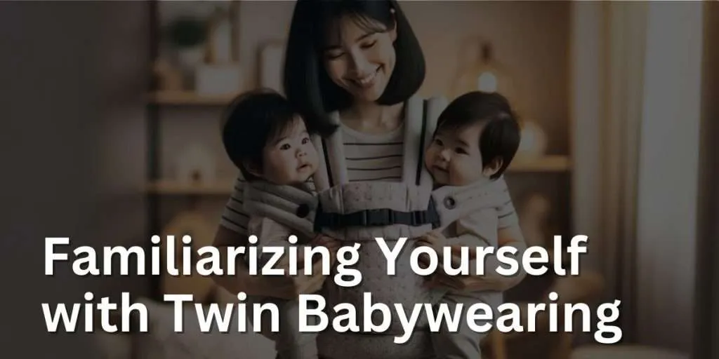  A parent with shoulder-length black hair comfortably wears a modern baby carrier with twins. The one-year-old twins are secured in the carrier, facing each other. The parent smiles in a cozy home setting with soft lighting and subtle decor.