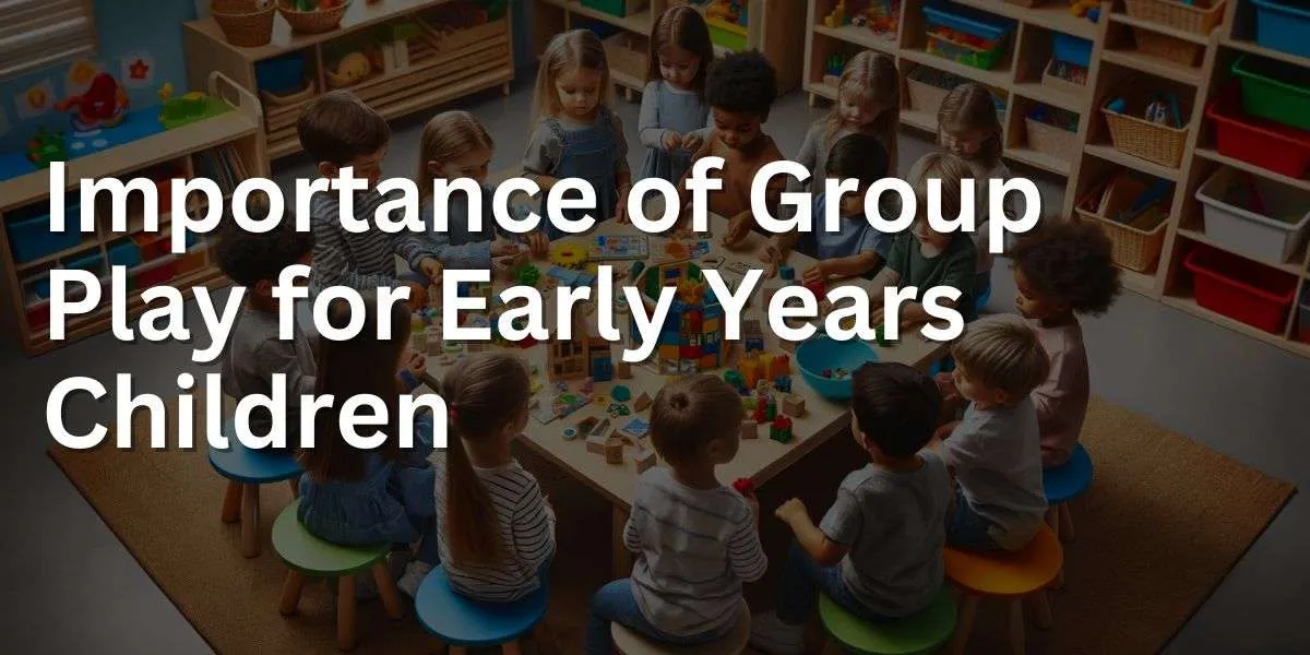 Photograph of a group of early years children from a mix of descents, engaging in group play in a vibrant classroom setting. They are gathered around a large table filled with educational toys and games, fostering social skills and cooperation. Some children are building with blocks, others are solving puzzles, and a few are involved in a pretend play scenario. The photo reflects the importance of group play in developing teamwork and communication among young children.